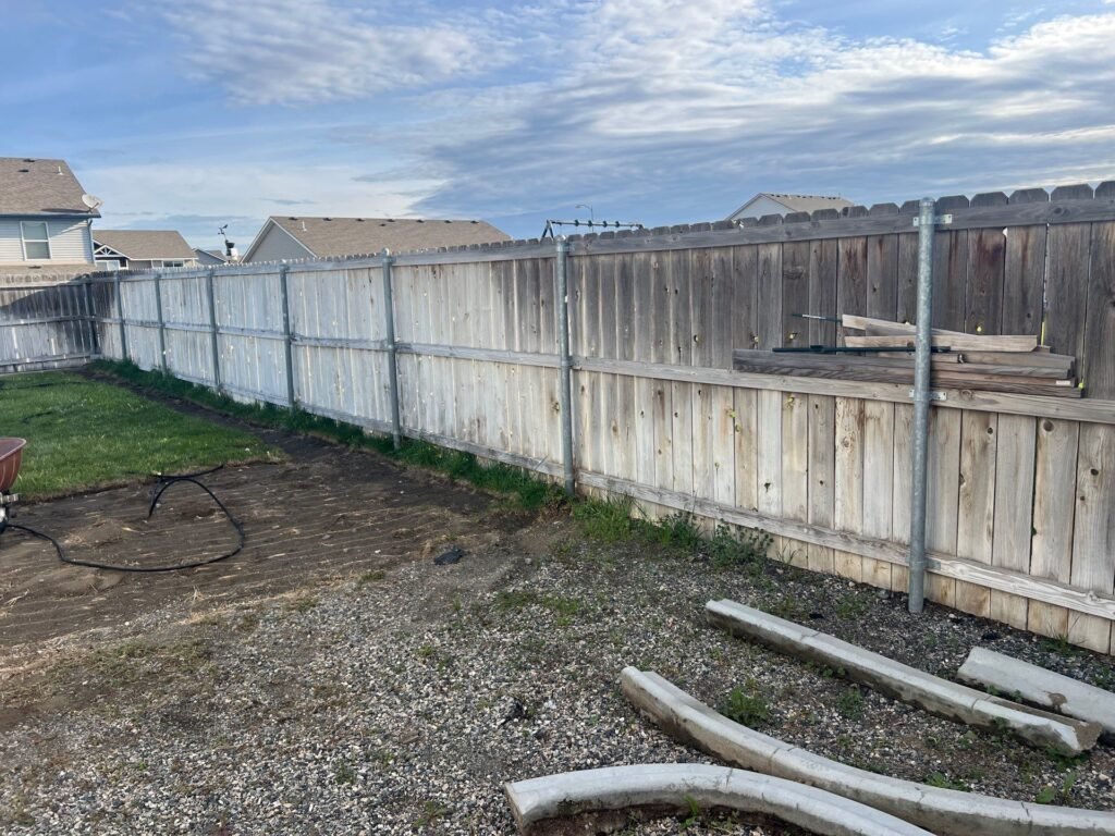 Grey, weathered cedar fence in Pasco, built in 2014 and never stained