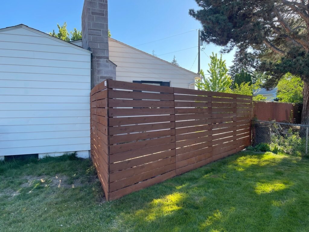 Richland horizontal fence after cleaning and re-staining in Sierra