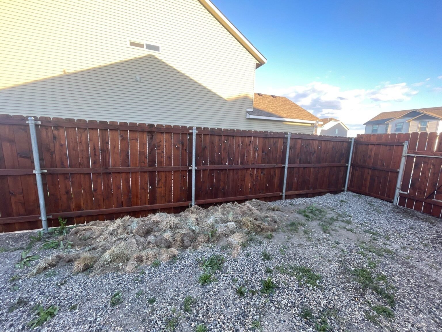 Cedar fence after restoration and staining by Tri-Cities Staining